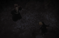 Renji and Ichigo fall into a deep pit.