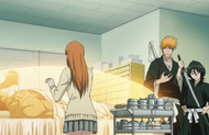 Ichigo looks on as Orihime heals Sado.