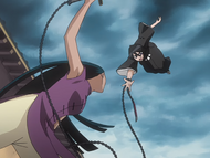 Rukia leaps over Yoshi to evade her attack.