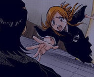 Orihime leaps forward to save Aramaki.