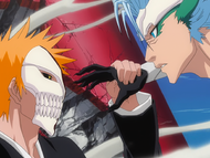 Ichigo grabs Grimmjow's hand to stop his attack.