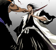 Kenpachi catches Tōsen's hand before he can complete his slash.