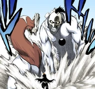 Ichigo is confronted by two large Hollows in the desert.