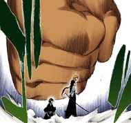 Yammy attempts to punch Ichigo and Rukia.