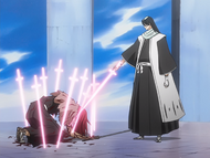 Renji is pinned down by Byakuya.