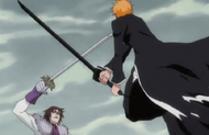 Muramasa blocks Ichigo's attack.