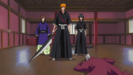 Ichigo, Rukia and Shū stand over Kumoi's body.