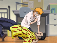 Ichigo pins Isshin to the ground.