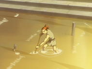 Renji attempts to fish with a spear.