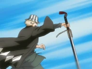 Urahara prepares to defend himself from Ichigo's impending attack.