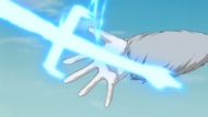 Starrk materializes a sword of Reishi from his bandoliers.