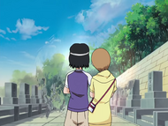 Grand Fisher approaches Karin Kurosaki and Yuzu Kurosaki.