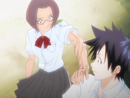 Suffering the effects of Bulb Scatter, Chizuru unwillingly grabs Tatsuki.