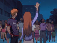 Orihime waves for Tatsuki.