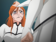 Loly grabs Orihime's hair.