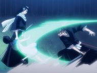 Renji slashes Rukia's face.