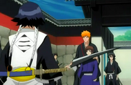 Rukia and Ichigo pretend to take Shū hostage.