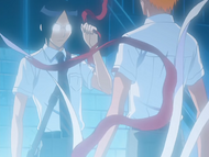 Uryū uses Reiraku and tears off a piece of Ichigo's red ribbon to show it to him.