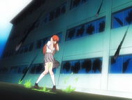 Orihime shields herself as the seeds hit all around her when Numb uses Bulb Scatter.