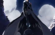Ichigo pins down Uryū with his larger sword after catching him off-guard with a Getsuga Tenshō.