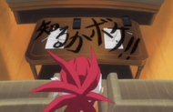 Renji sees Saru and Hebi wrote an insult on the table instead of writing their letters.