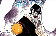 Chappy restrains Ichigo by wrenching his arm behind his back.