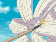 Aldegor blocks Ikkaku Madarame's strike with his back appendages.