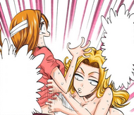 Rangiku tickles Orihime to cheer her up.