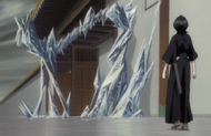 Rukia sees a nearby entrance covered with ice.