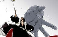 Gremmy generates a disembodied hand to squash Kenpachi.