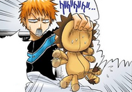 An irritated Ichigo grabs Kon.