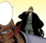 Urahara appears alive and unharmed behind Yammy.