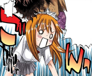 Orihime smashes her head into Sado's face when she wakes from a dream.