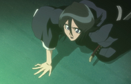 Rukia is forced to her knees by the realms merging.
