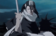 Kenpachi grabs Byakuya's sword.