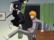 Rukia dodges Ichigo's kick.