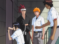 Renji watches as Uryū picks the lock to Orihime's apartment.