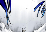 Kenpachi casually slashes through a building.