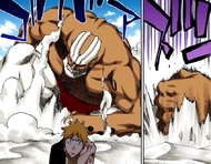 Yammy begins getting up behind Ichigo.