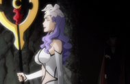 The Arrancar watches a screen.