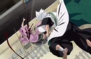 Hitsugaya slashes the Tōjū across the chest.