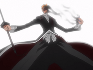 Ichigo rips the Hollow mask off his face.