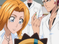 Rangiku and Renji inspect Kon.