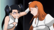 Loly grabs Orihime's hair.