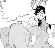 Tatsuki hits Orihime.