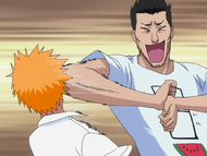 Isshin greets Ichigo with a flying elbow.