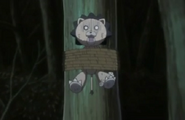 Kon tied to tree by Nozomi.