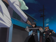 Di Roy attacks a distracted Rukia Kuchiki.