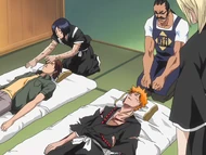 Urahara watches as Hanatarō prepares to treat Ichigo and Keigo.