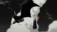 Ichigo tosses aside the mortally wounded Ulquiorra.